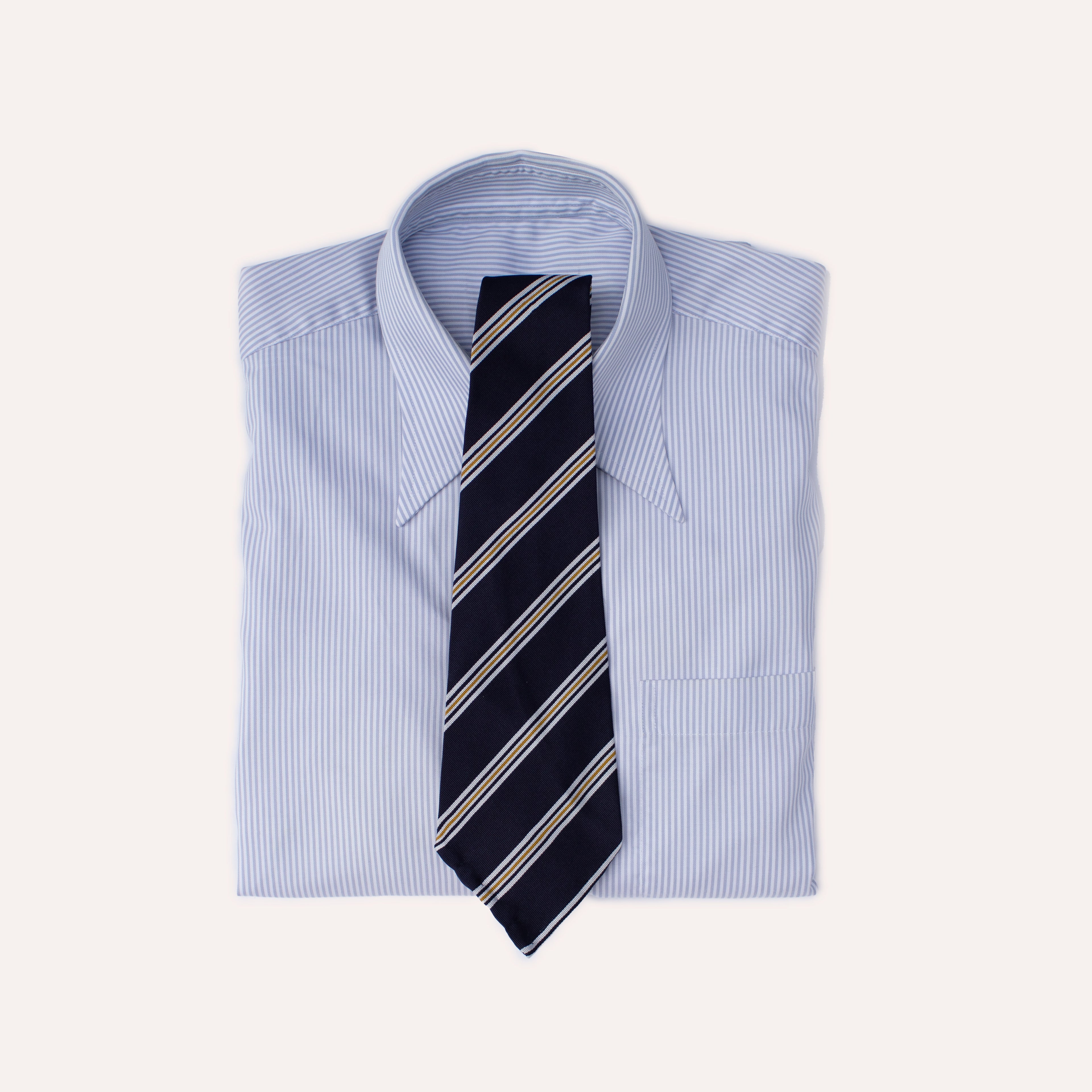 Corbata de seda Mogador enrollada a mano con rayas azules, blancas y amarillas