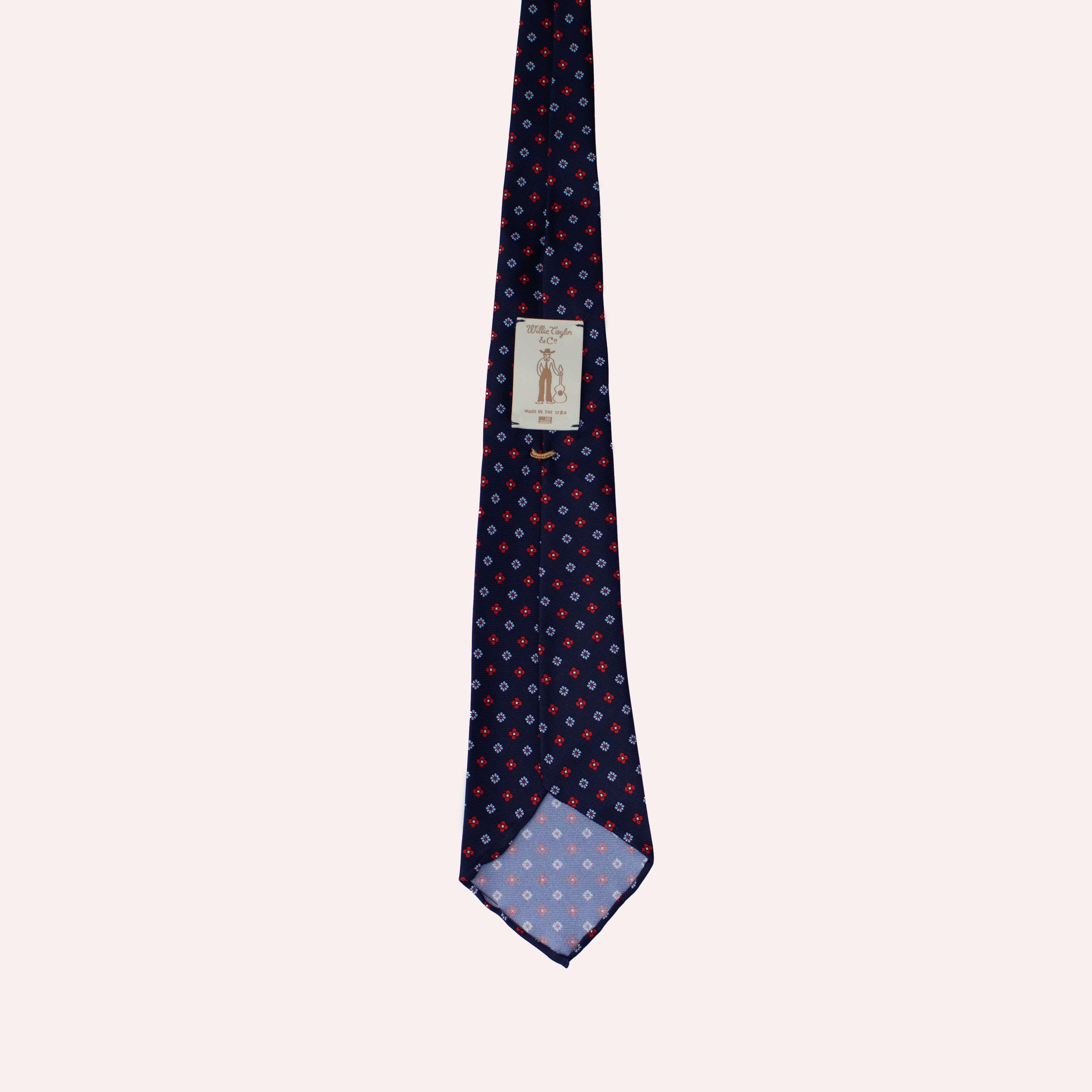 Corbata de seda laminada a mano de 36 oz con estampado de fular de flores azul marino