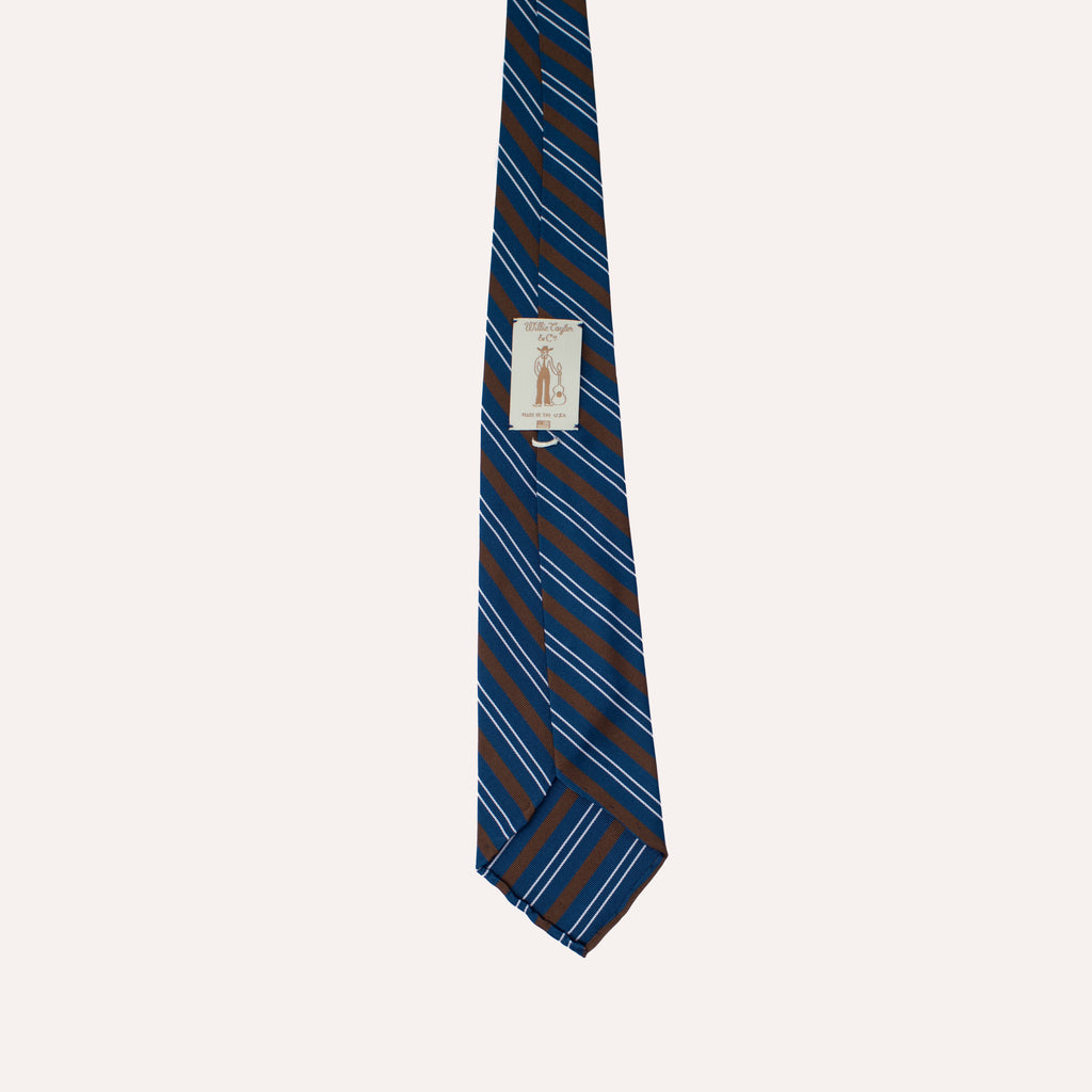 Corbata de seda Mogador enrollada a mano a rayas azules, blancas y marrones