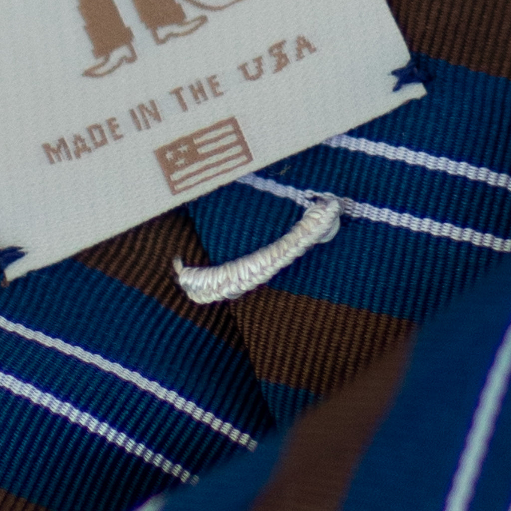 Corbata de seda Mogador enrollada a mano a rayas azules, blancas y marrones